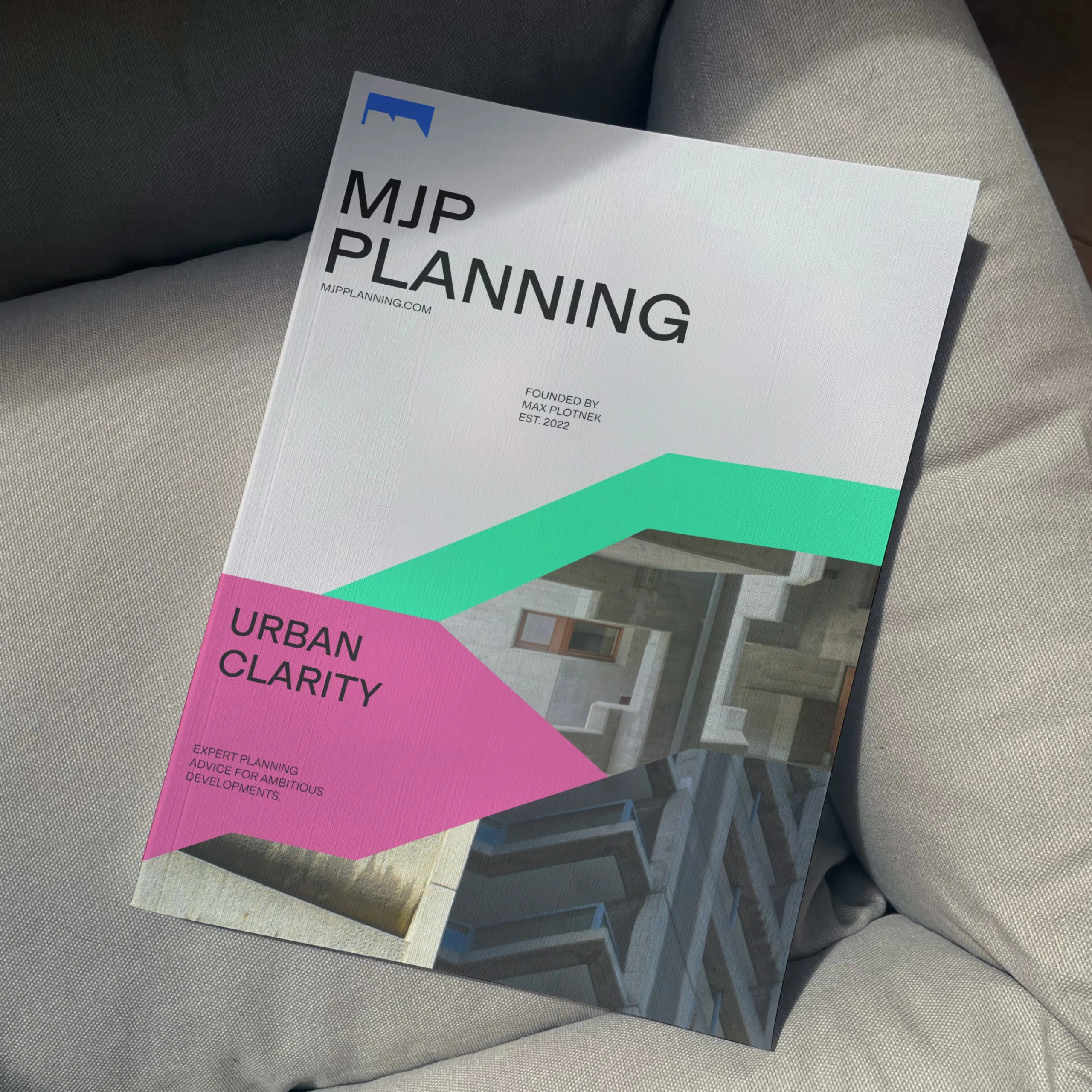 A mockup of a MJP branded magazine
